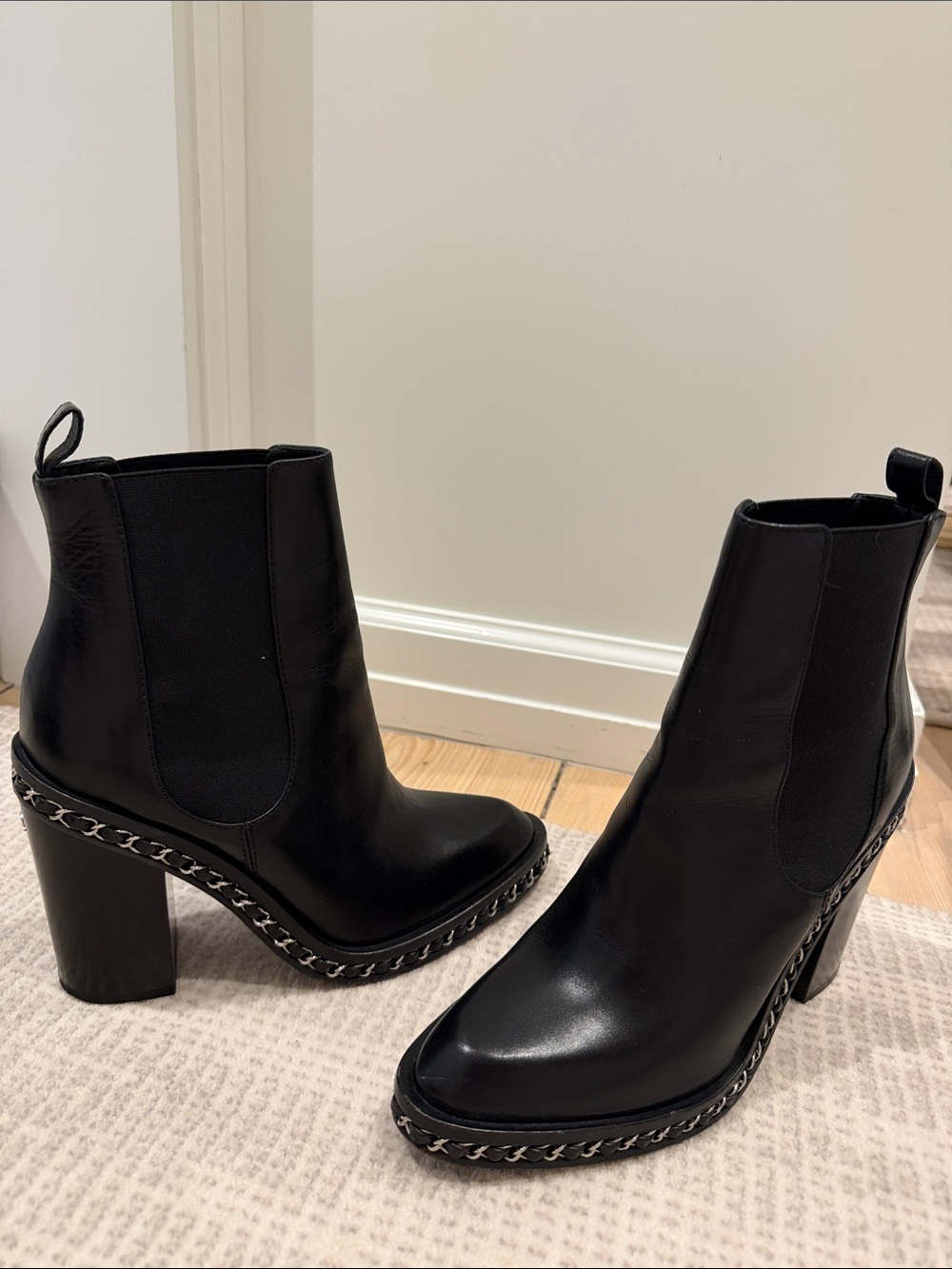 CHANEL Black Leather Chelsea Block Heel Boots with Chain Trim